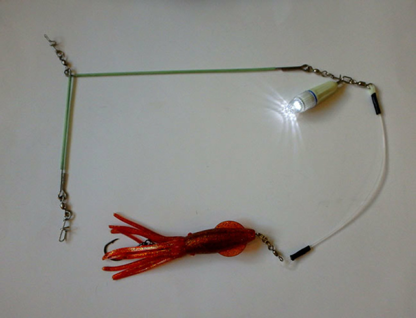 Glow spreader bar rigged with natural Z2 Squid on 500lb test leader and  white trophy torch